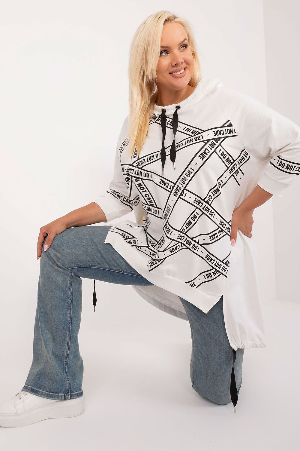 Luxury asymmetrical plus size blouse in cotton-spandex by Relevance, featuring rhinestone detail, 3/4 sleeves, and a classic round neck for elegant style.