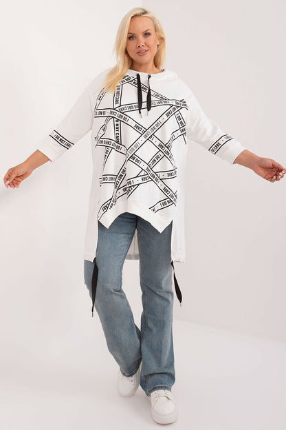 Chic cotton-spandex plus size blouse designed by Relevance, showcasing an asymmetrical cut with sparkling rhinestones, perfect for sophisticated everyday wear.