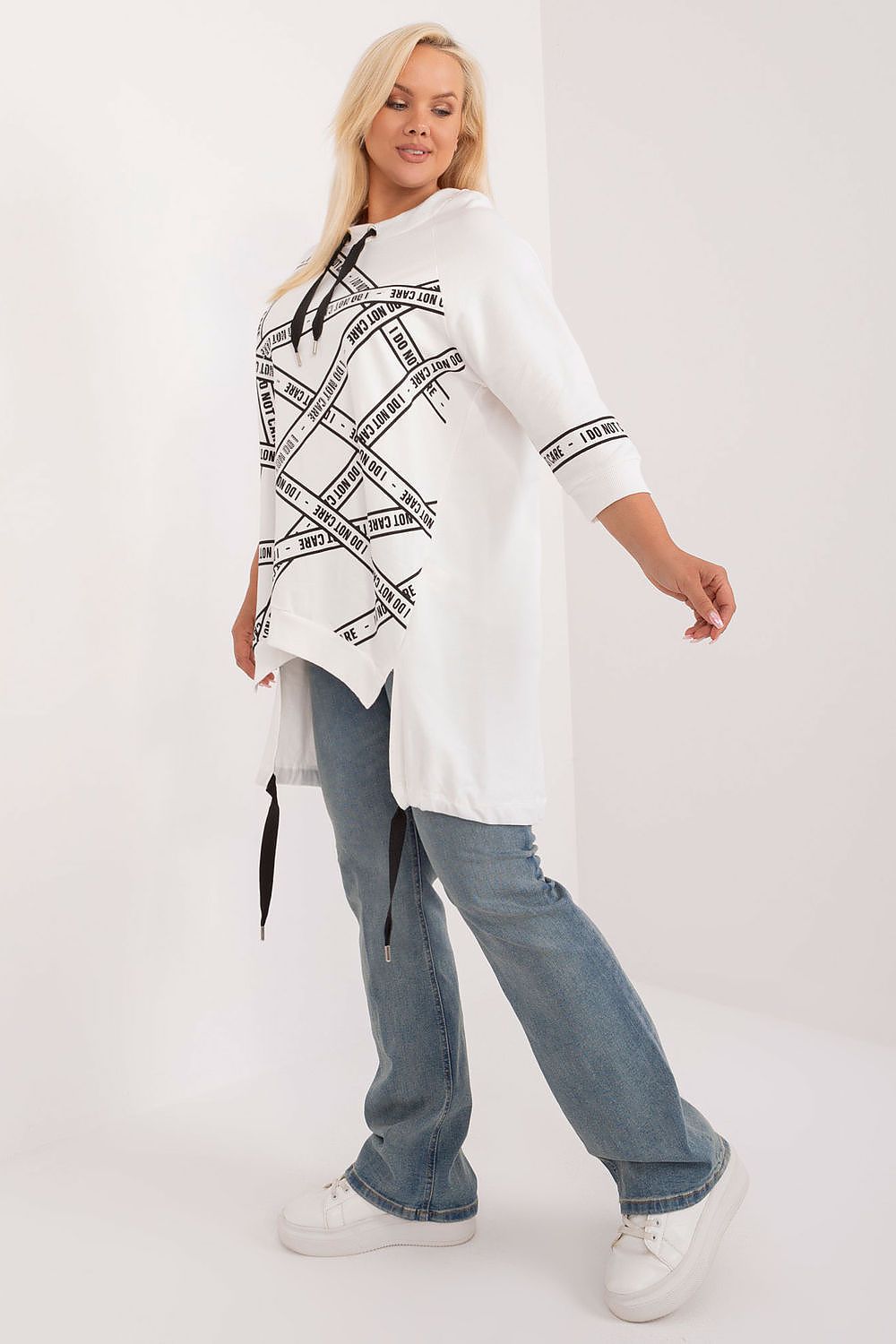 Elegant plus size blouse from Relevance, crafted from soft cotton-spandex, designed with a stylish asymmetrical silhouette and adorned with rhinestones for a luxurious touch.