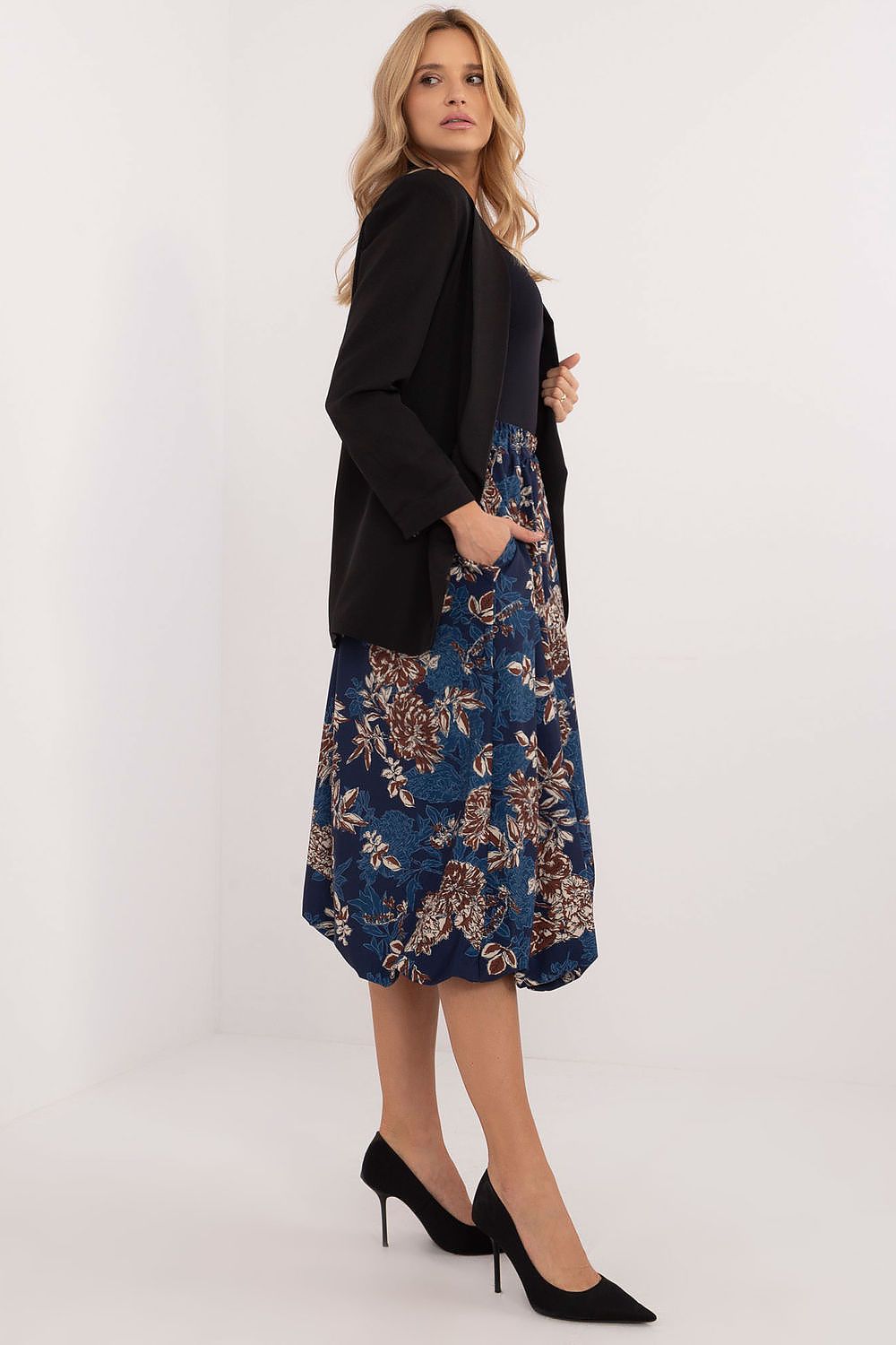 Italy Moda polyester midi bomber skirt showcasing a luxurious floral print, featuring functional side pockets and a comfortable elastic fit.