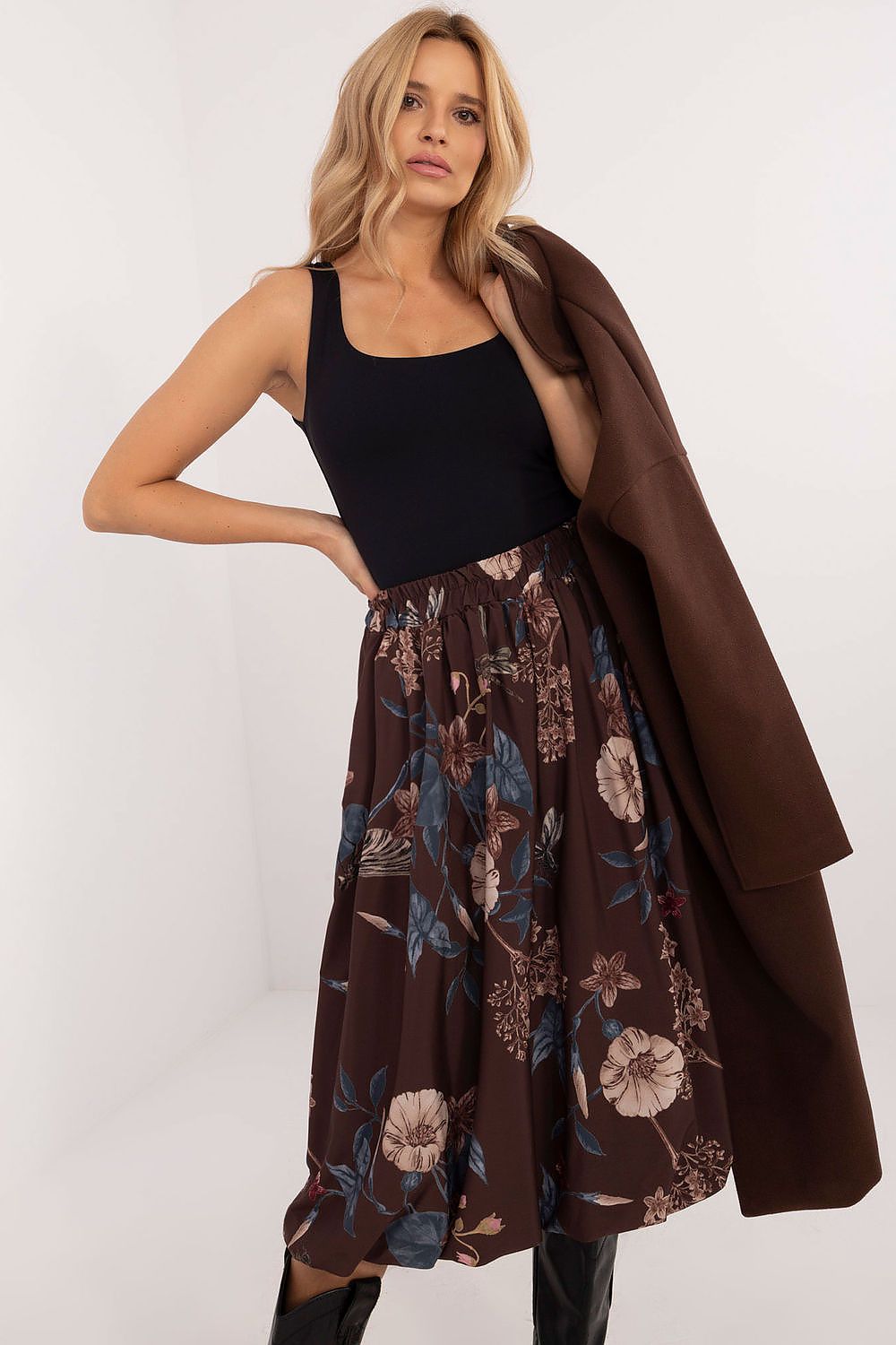 Luxurious Italy Moda midi skirt made of comfortable polyester, combining elegance and functionality with hidden side pockets.
