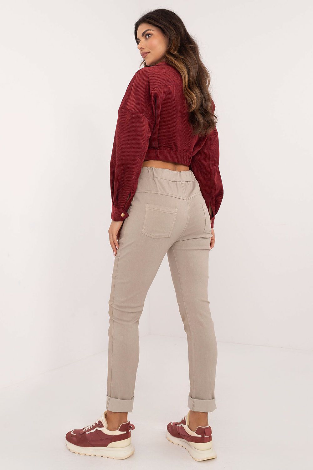 Chic Italian women's glossy trousers by Italy Moda, designed for comfort and style, ideal for work and casual wear.