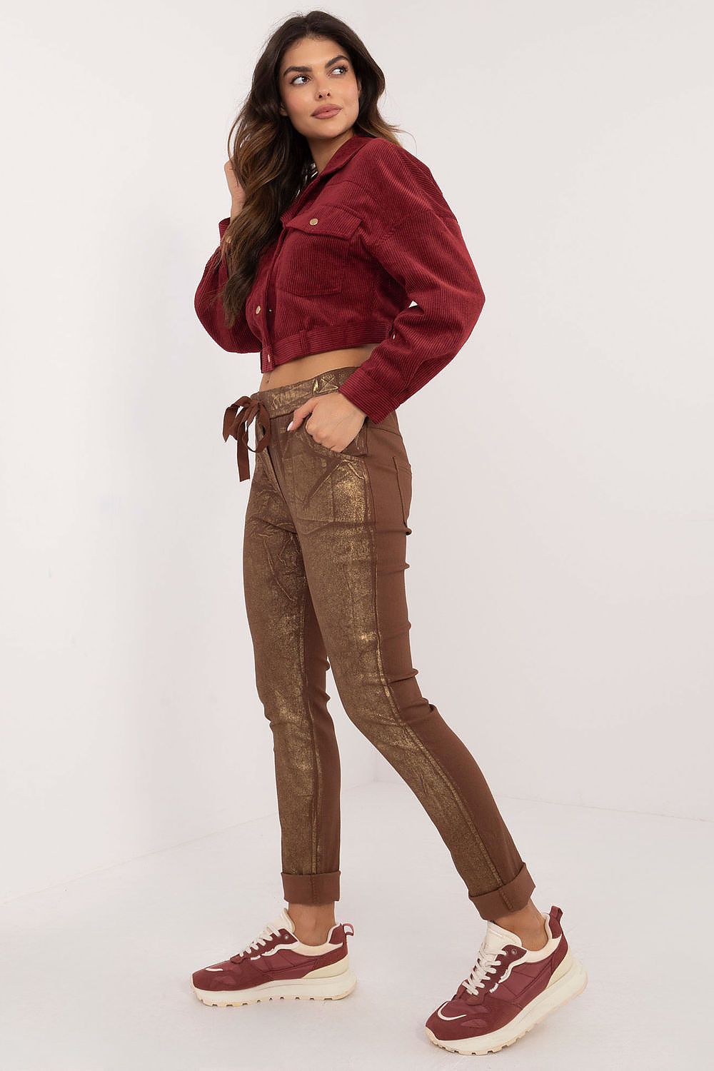Elegant Women's glossy fabric trousers by Italy Moda, showcasing mid-rise design and tapered legs, perfect for a luxurious casual outfit.