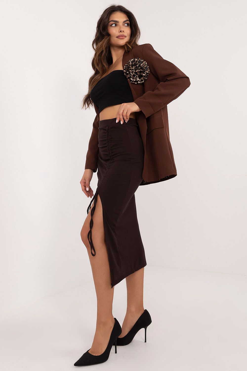 Close-up view of Italy Moda's luxurious ribbed midi pencil skirt, showcasing its sleek fit and feminine design, ideal for chic everyday wear.