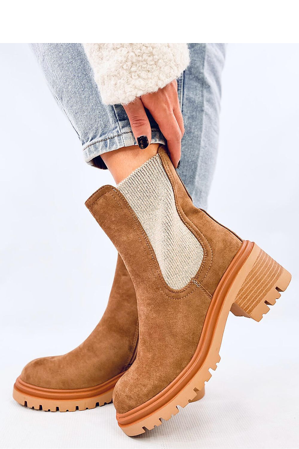 Sophisticated Inello Women's Jodhpur Boots made with ecological suede, highlighted by a plush fur lining for comfort and style.