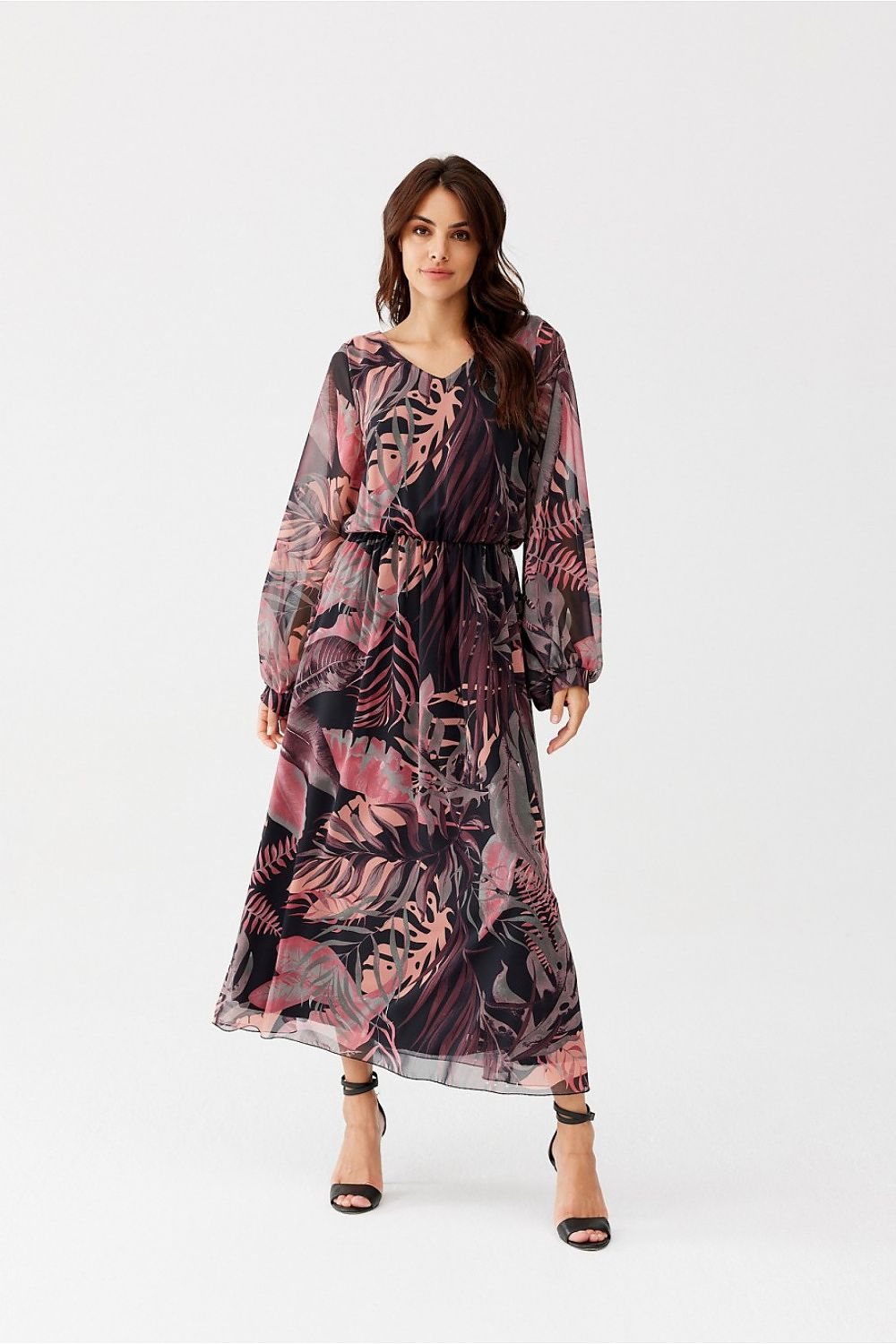 The elegant flow of the Ariela Long Chiffon Dress, showcasing its lightweight chiffon material by Roco Fashion, ideal for formal and casual occasions.