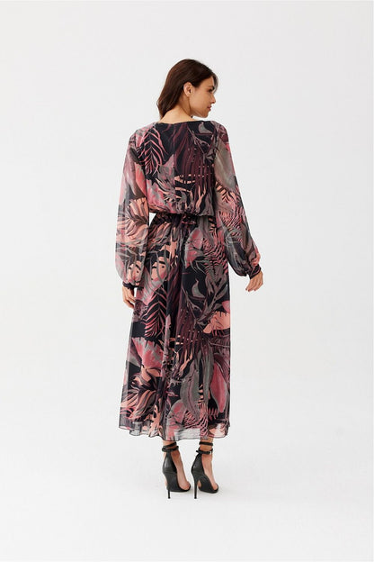 Stylish model wearing the Ariela Long Chiffon Dress with an elastic waistband and exquisite designs, crafted by Roco Fashion.