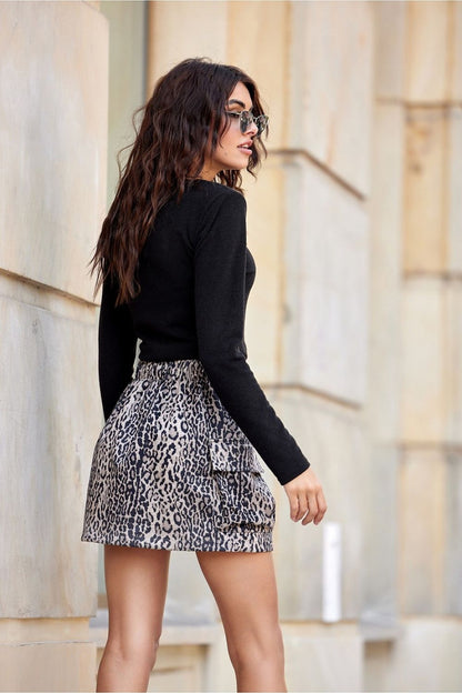 Model wearing the stylish Lara Mini Skirt by Roco Fashion, featuring elastic back for a flattering fit and chic cargo pockets, ideal for versatile dressing.