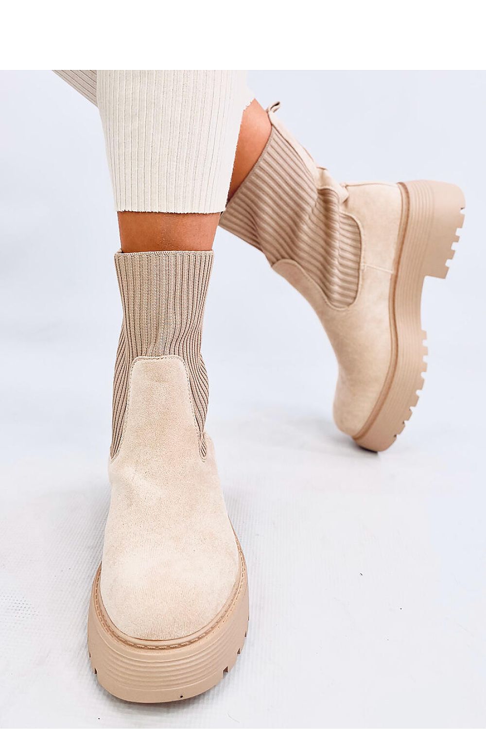 Stylish Inello Women's Suede Platform Boots with a massive platform and 5.5 cm heel height, perfect for elegant winter fashion.