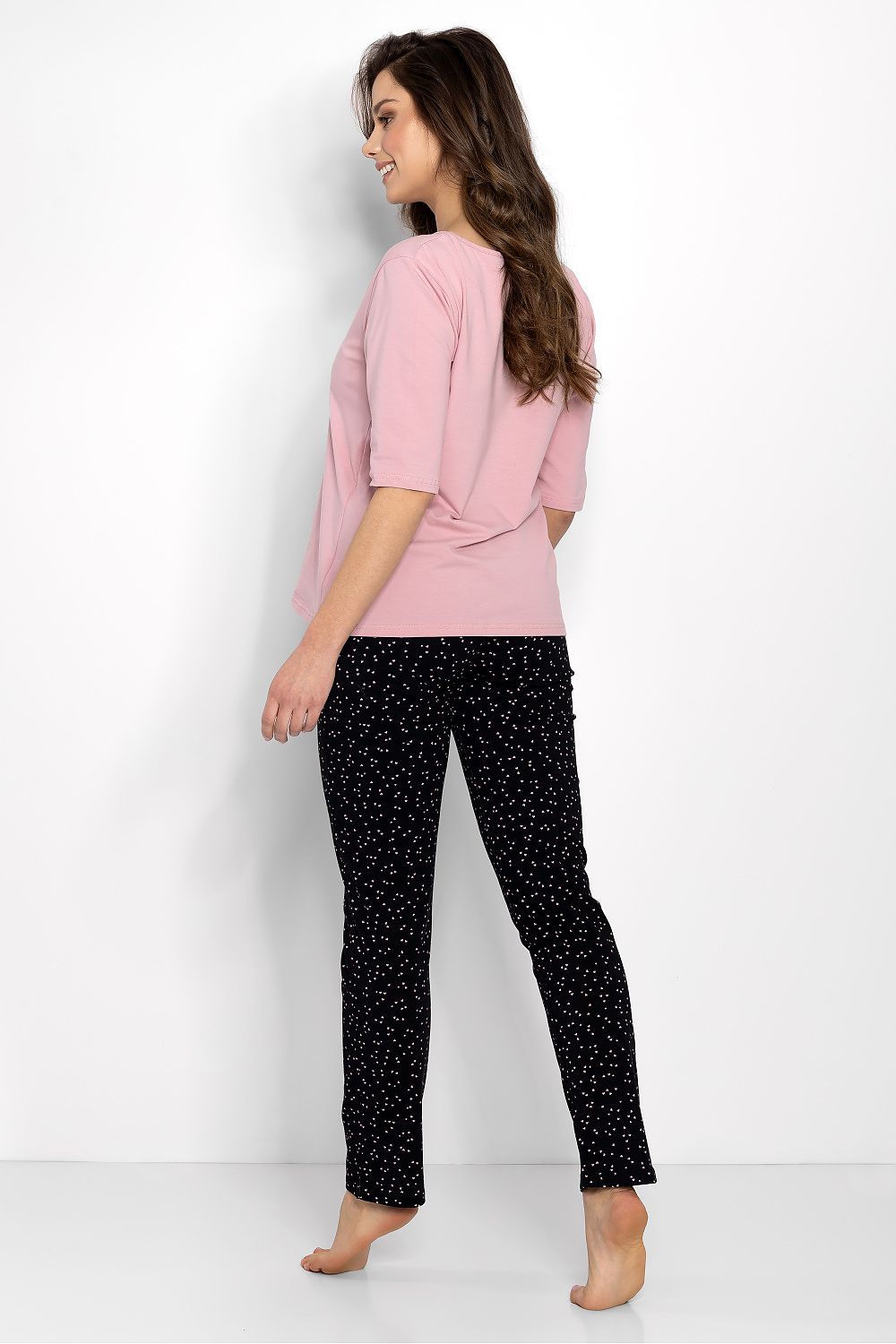 Beautifully crafted women's pyjamas set from Momenti Per Me, showcasing a feminine silhouette with long slim-cut pants and hypoallergenic, OEKO-TEX certified fabrics.