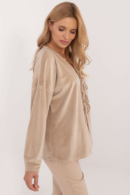 Italy Moda's stylish velour blouse featuring a heart neckline and long sleeves, ideal for adding feminine charm to any outfit.