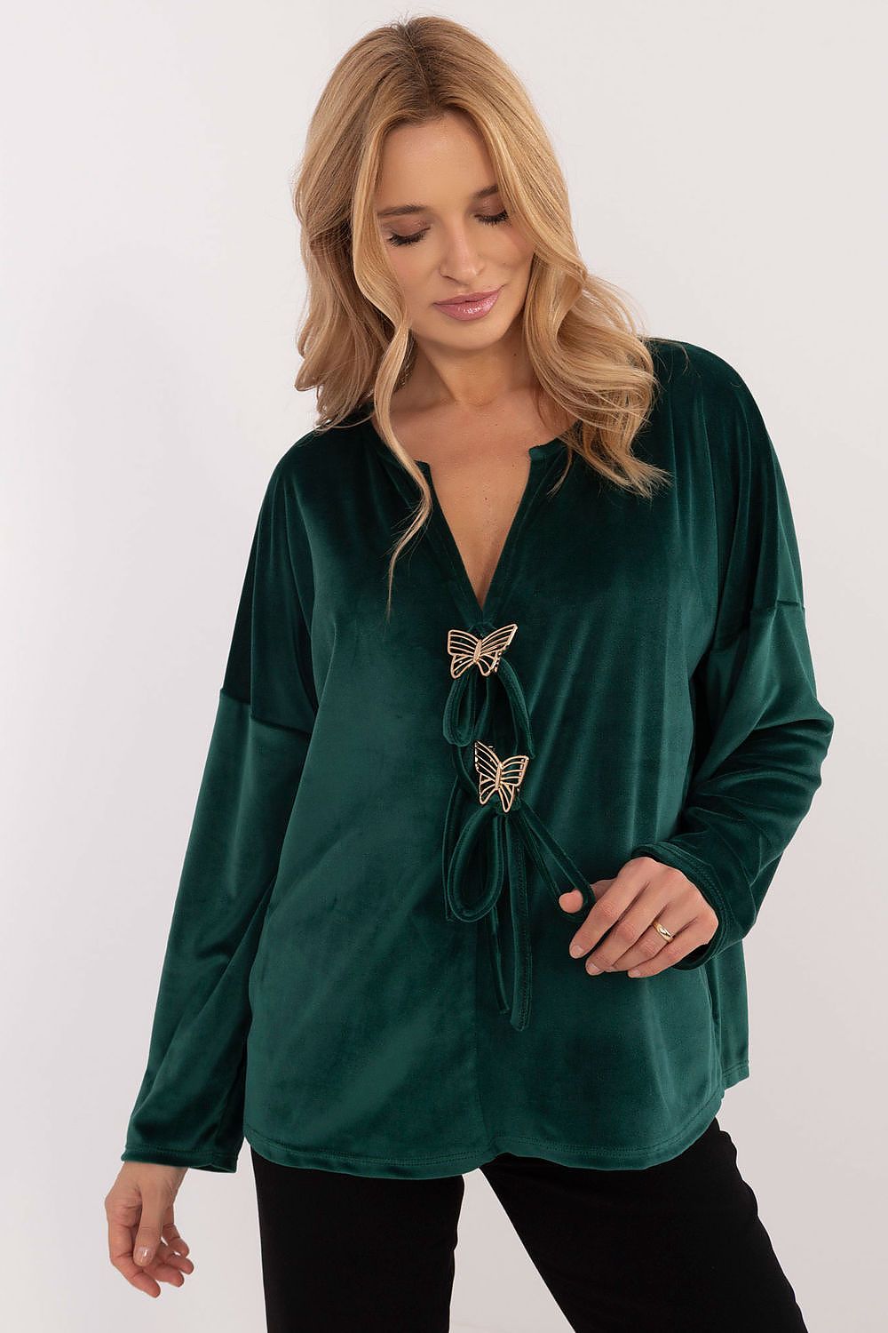 Full view of the elegant long-sleeved velour blouse from Italy Moda, demonstrating its feminine charm and versatility with a smooth design.