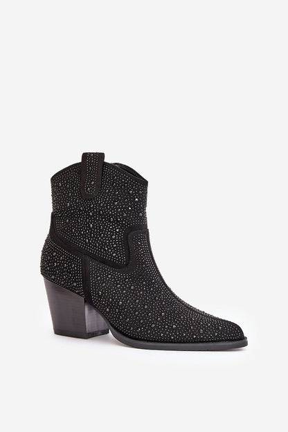 Close-up view of exquisite embellishments on luxury suede cowboy boots, showcasing distinct design features, by Step in Style.