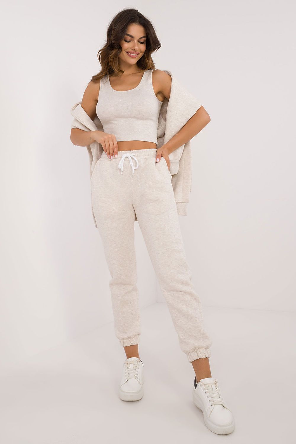 Complete set showcasing the mélangé pattern and luxurious fabric of the warmed women's casual set, designed by Factory Price for stylish colder weather wear.