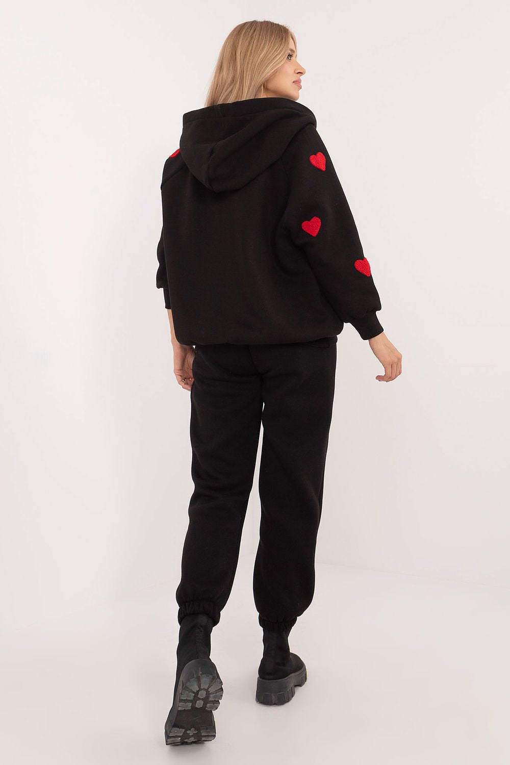 Elegant long-sleeve sweatshirt with half-zip fastening and charming heart patches, designed by Factory Price for everyday luxury.