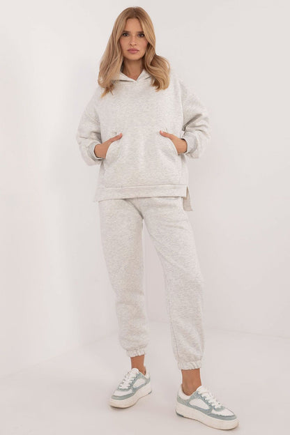 Elegant EU Size 0 warmed women's sweatshirt and pants set from Factory Price, crafted from soft materials, perfect for chilly days.
