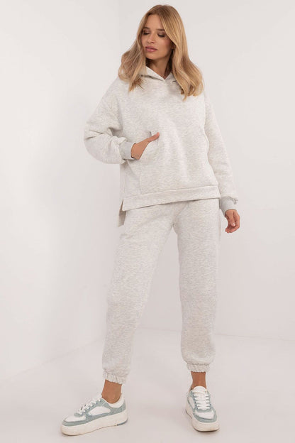 Fashionable warm sweatshirt and pants set made from cotton-polyester blend by Factory Price, designed for casual elegance in cold weather.