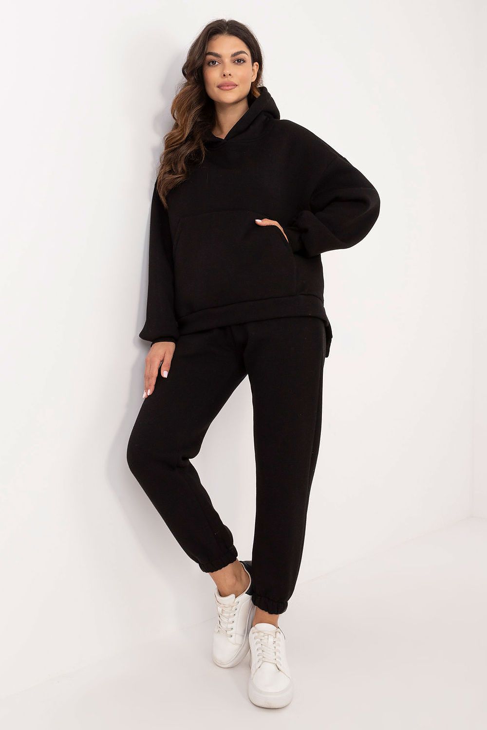 Sophisticated women's hooded sweatshirt set, EU Size 0, by Factory Price, featuring ribbed cuffs and high-waisted pants for a flattering silhouette.