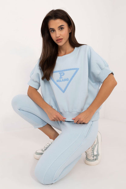 Close-up view of the minimalist design print on the luxury women's sweatshirt set by Factory Price, creating a youthful and fashionable look.