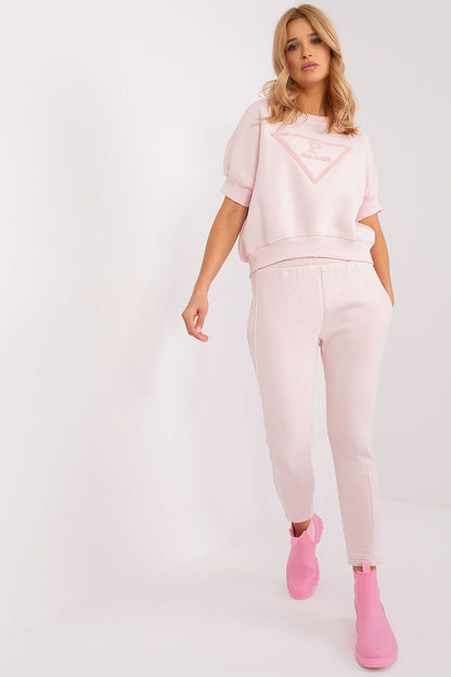 Close-up of the luxurious fabric of the women's insulated sweatshirt set by Factory Price, showcasing comfort and stylish minimalist design.