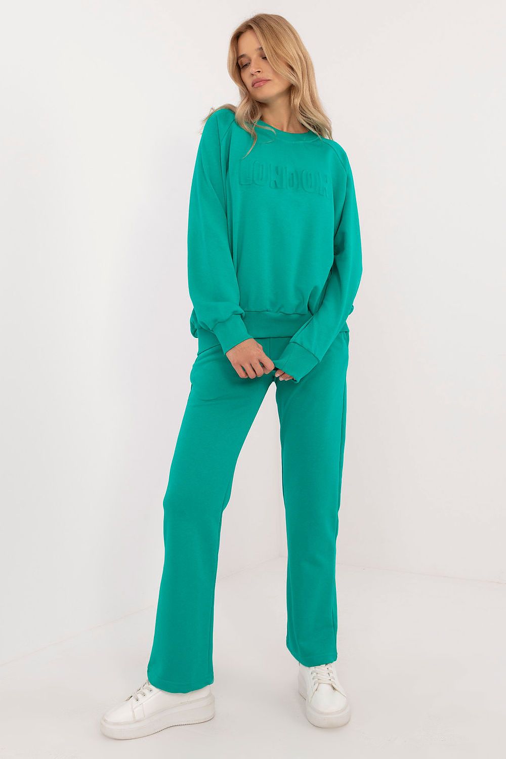 Luxury Women's Casual Tracksuit Set featuring a stylish sweatshirt and high waist pants, crafted from a premium cotton/polyester blend, perfect for everyday elegance, by Factory Price.