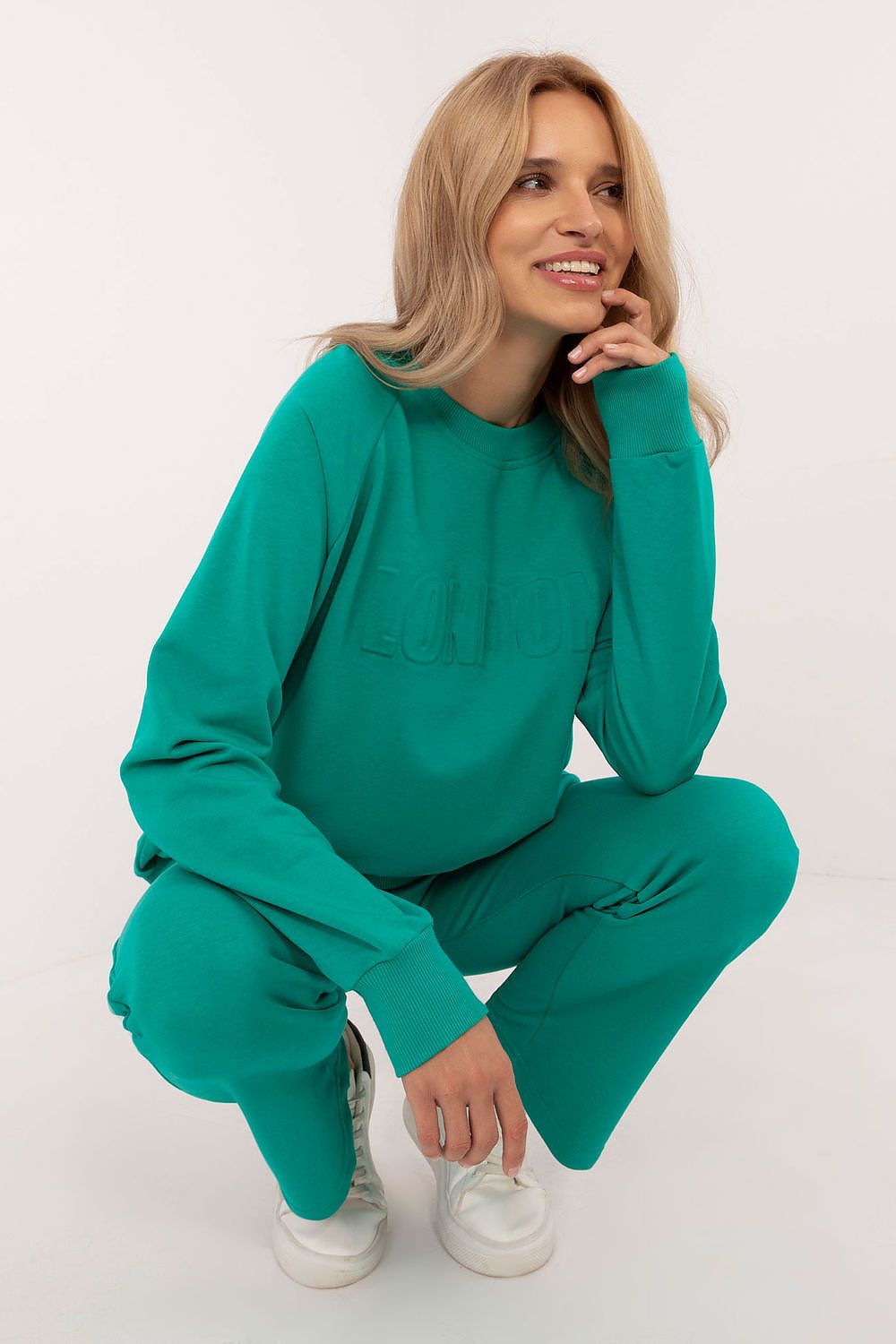 Luxury women's casual tracksuit set featuring a stylish sweatshirt and high waist pants, crafted from a comfortable cotton/polyester blend by Factory Price.
