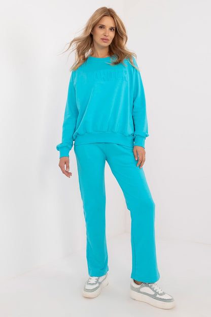 High waist pants of the luxury women's casual tracksuit set by Factory Price, highlighting the drawstring waistband and practical side pockets.