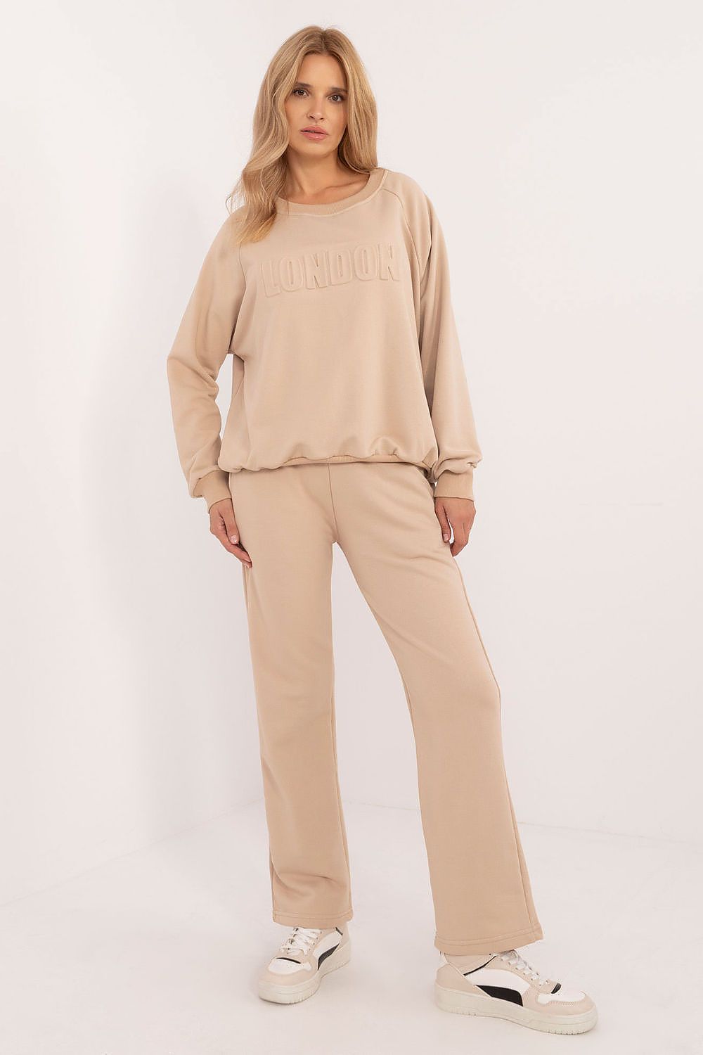 Elegant women's tracksuit display, highlighting the high waist pants and long sleeve sweatshirt, perfect for stylish everyday wear, by Factory Price.