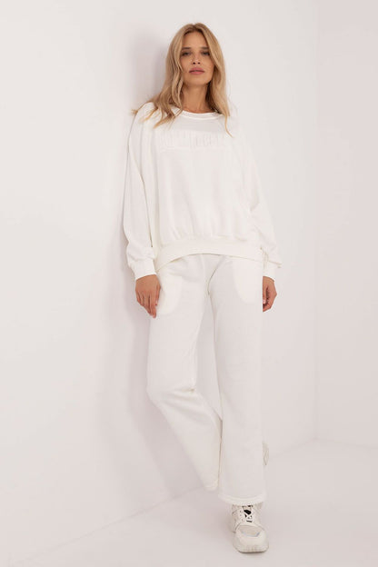 Comprehensive view of women's casual tracksuit ensemble, emphasizing the comfortable fit and stylish design details, expertly created by Factory Price.