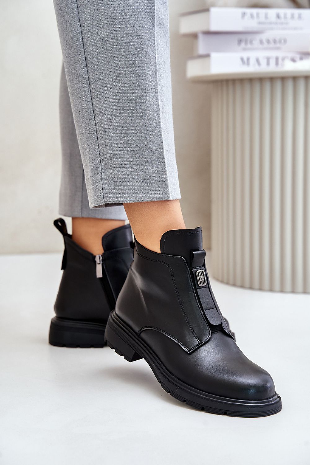 Elegant women's high-quality natural leather flat-heeled ankle boots with zipper, designed by Step in Style. Perfect for autumn-winter fashion, featuring warm insulation and a chic design.