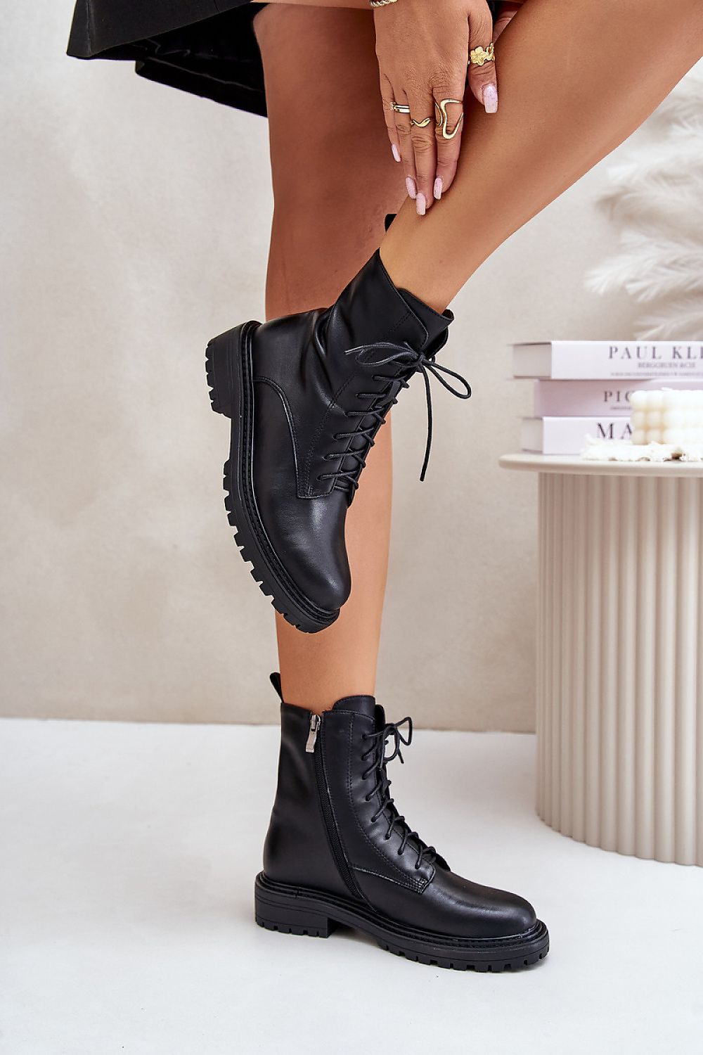 Luxury ankle boots for women by Step in Style with flat heel and stylish lacing and zipper details.