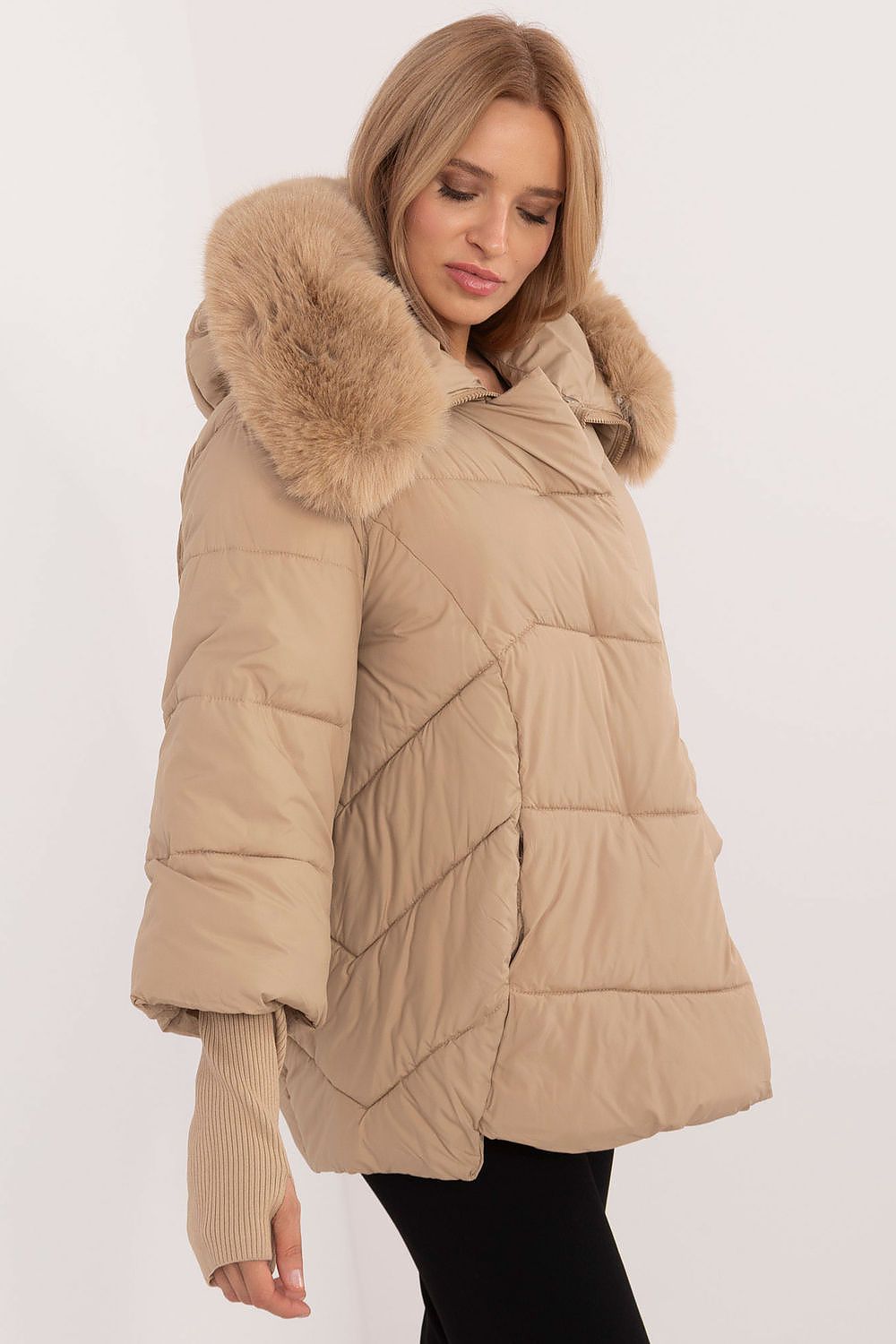Luxurious women's quilted jacket from MBM with synthetic insulation, designed for warmth and comfort on chilly days.
