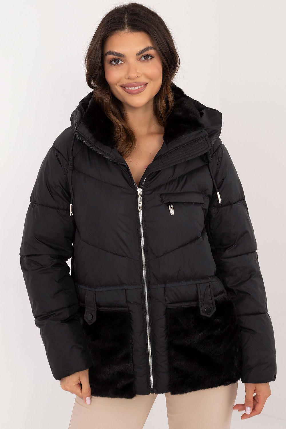MBM luxury women's quilted jacket displayed on a model, demonstrating its elegant design and functional hood in a chilly autumn setting.