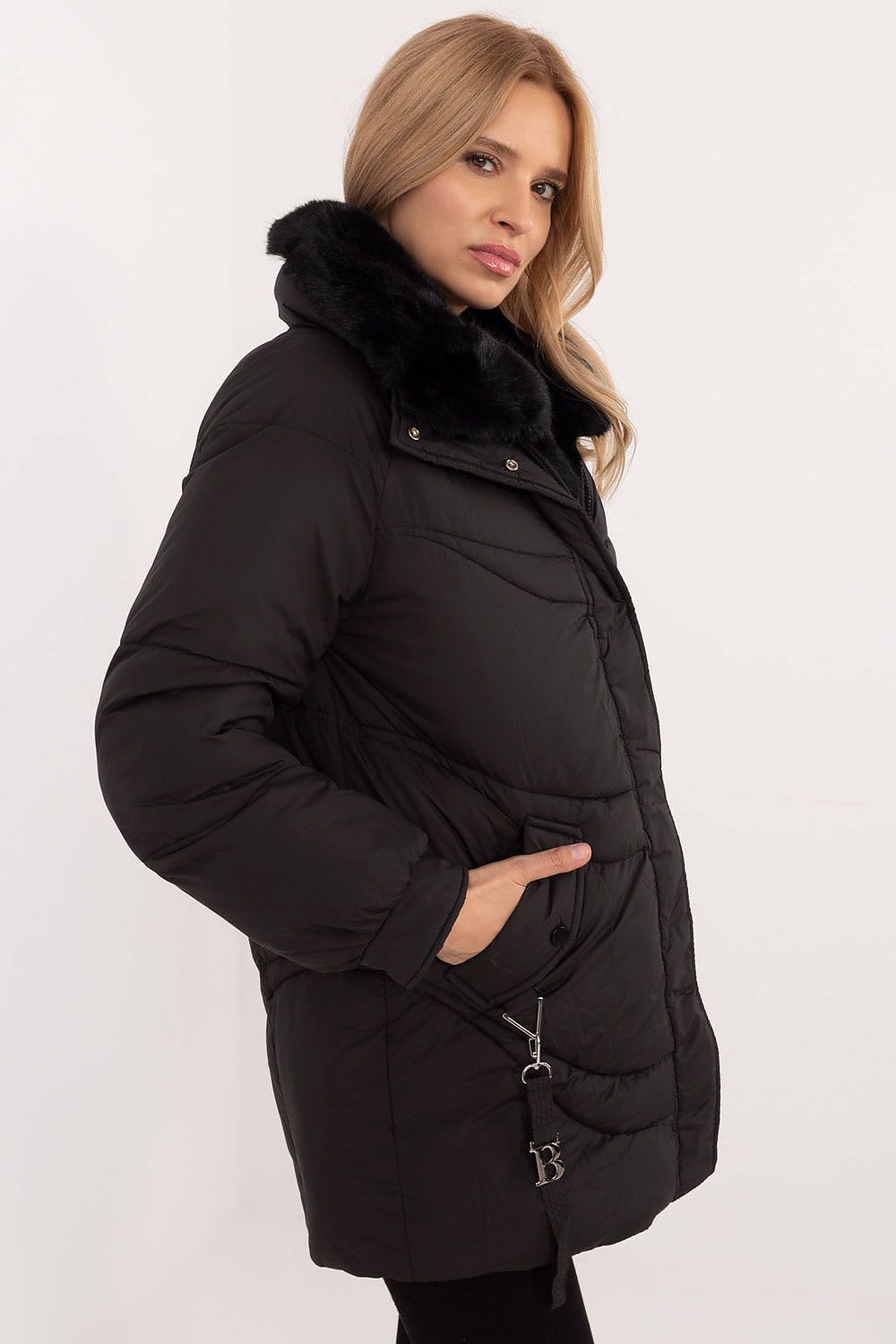Sophisticated display of the MBM women's insulated quilted jacket with fur detailing, perfect for autumn/winter outings, showcasing luxury fabric and chic design.