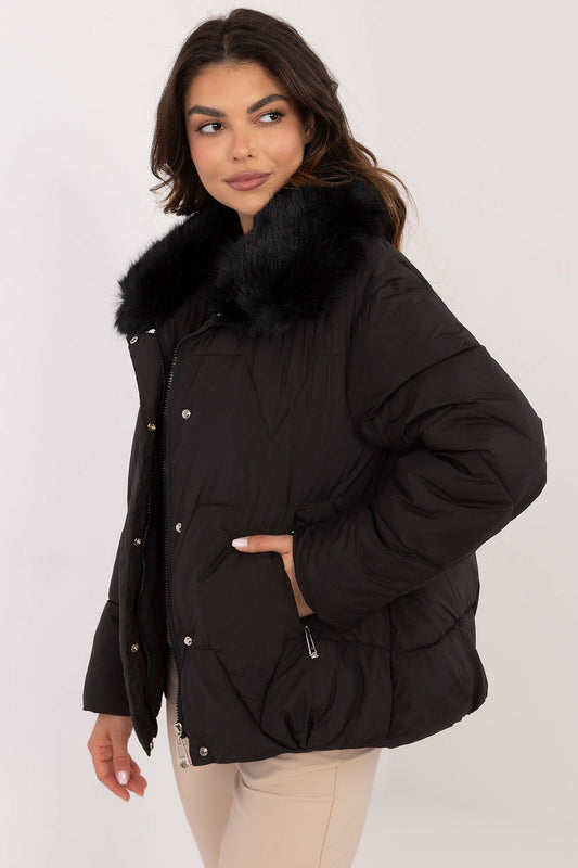 Elegant women's quilted jacket with a luxurious fur-trimmed collar, designed by MBM, ideal for staying warm and chic in colder seasons.