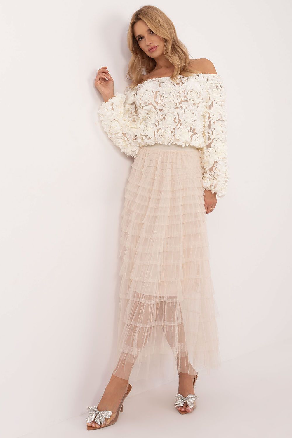 Fashionable model wearing the elegant midi tulle skirt, emphasizing the versatility and comfort of the design by Factory Price for various events.