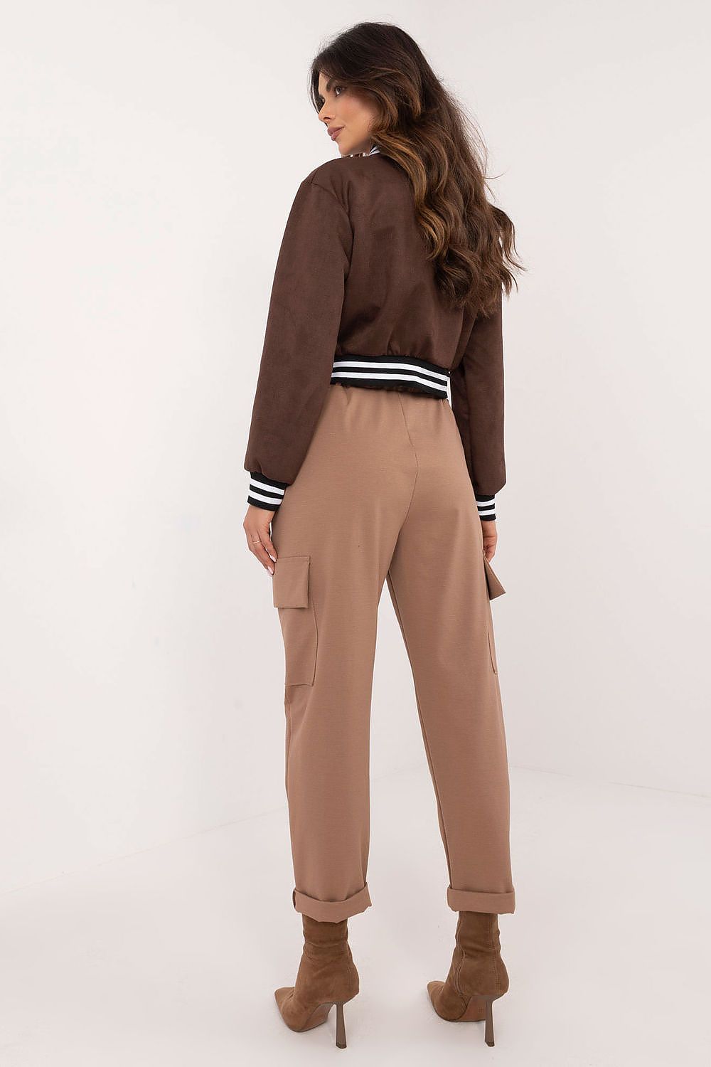 Model wearing Och Bella Women's High Rise Cargo Trousers, exemplifying comfort and chic styling for modern women.