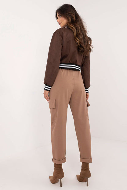 Model wearing Och Bella Women's High Rise Cargo Trousers, exemplifying comfort and chic styling for modern women.