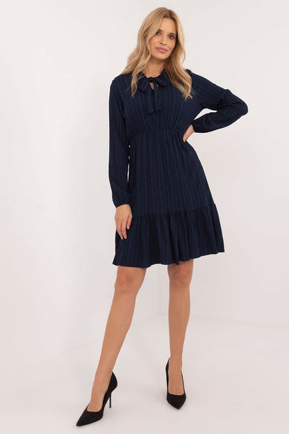 Full view of the versatile Och Bella daydress, highlighting its feminine silhouette and ruffled hem, perfect for casual or work wear.