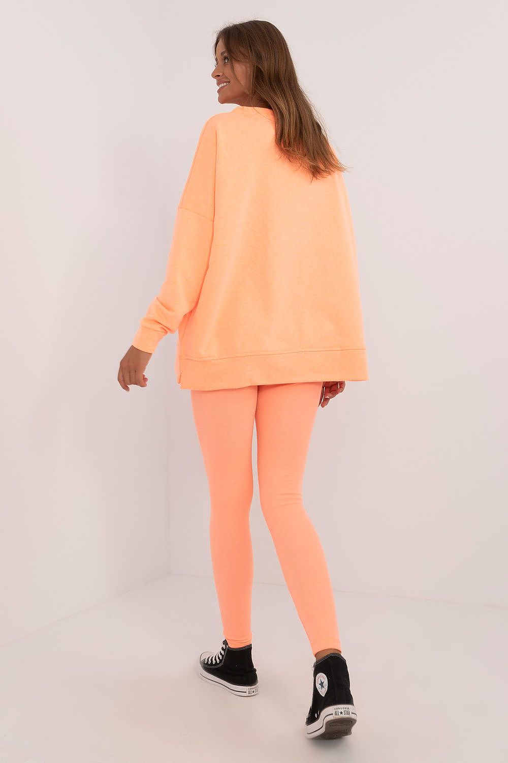 Elegant display of Women's Casual Sweatshirt and Leggings Set by Factory Price, showcasing its stylish long cut and contemporary design for everyday wear.