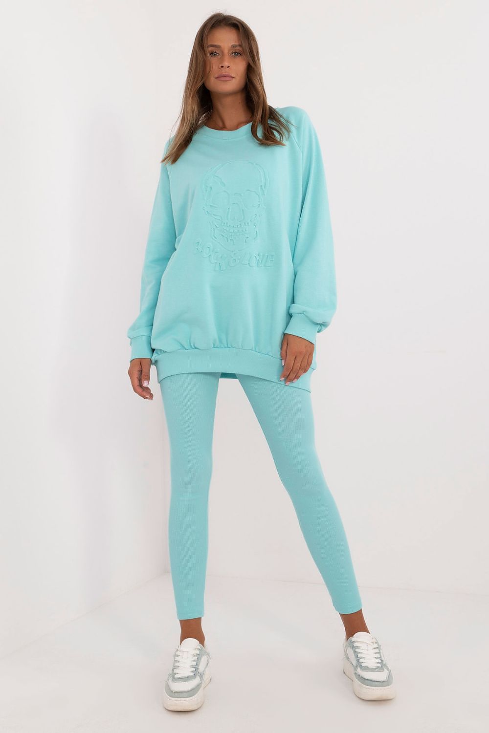 Luxury Women's Leggings and Sweatshirt Set displayed on a model, illustrating how the cotton-spandex blend fits beautifully and enhances movement, provided by Factory Price.
