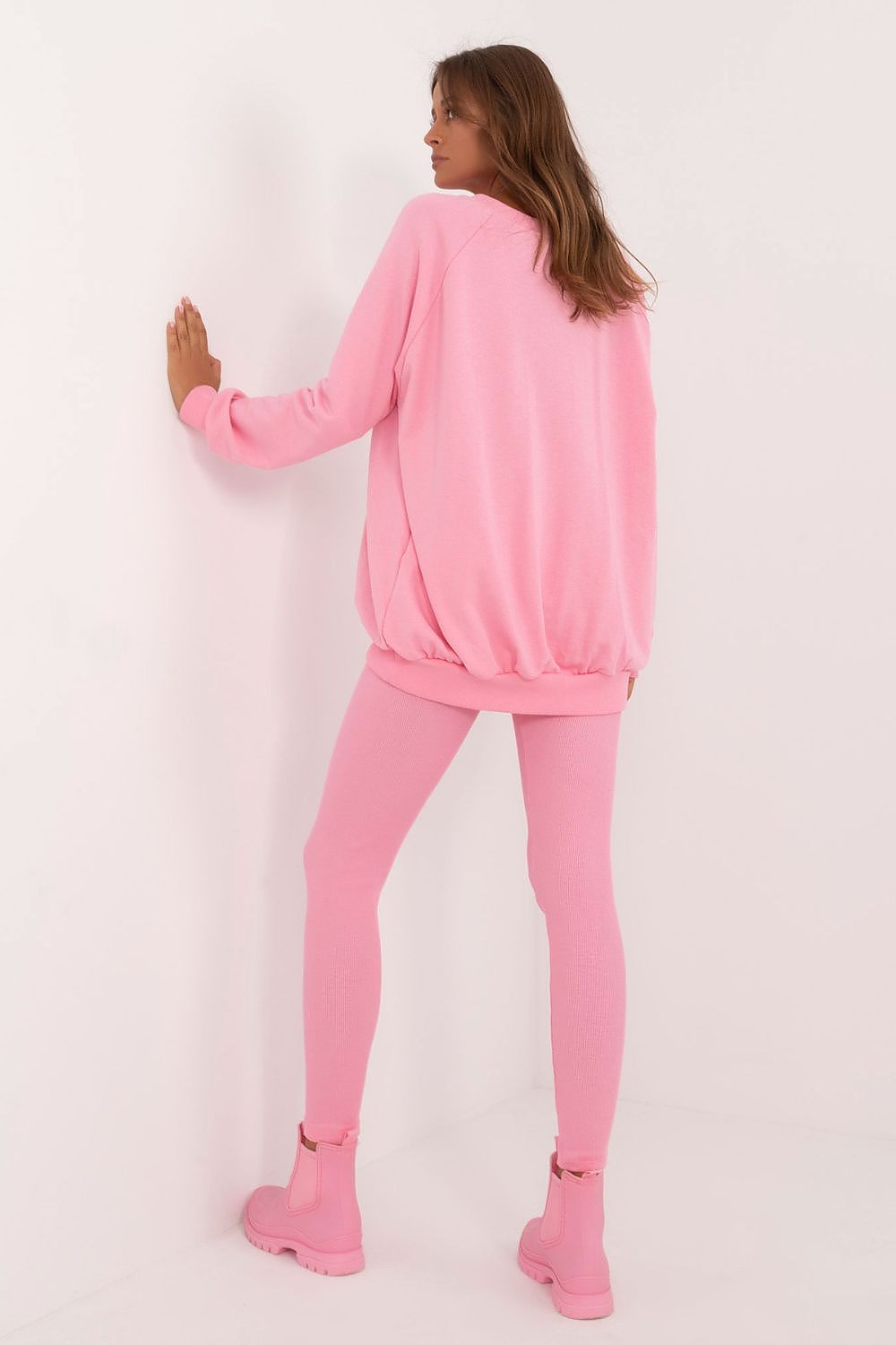 Elegant Sweatshirt from Luxury Women's Leggings and Sweatshirt Set by Factory Price, showcasing long sleeves, a round neckline, and an embossed front design.