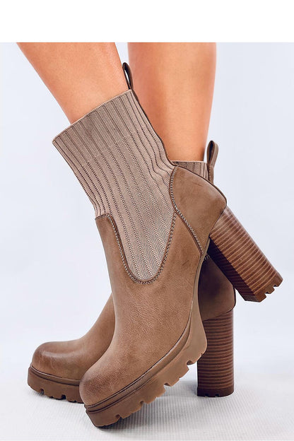 Chic Inello women's heel boots available in sizes EU 36-41, combining fashion and practicality in a sleek sock style.