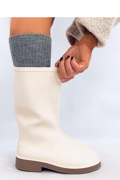 Luxury waterproof rubber women's military cut Wellington boots by Inello, featuring a matte finish and wider shaft for easy wear.