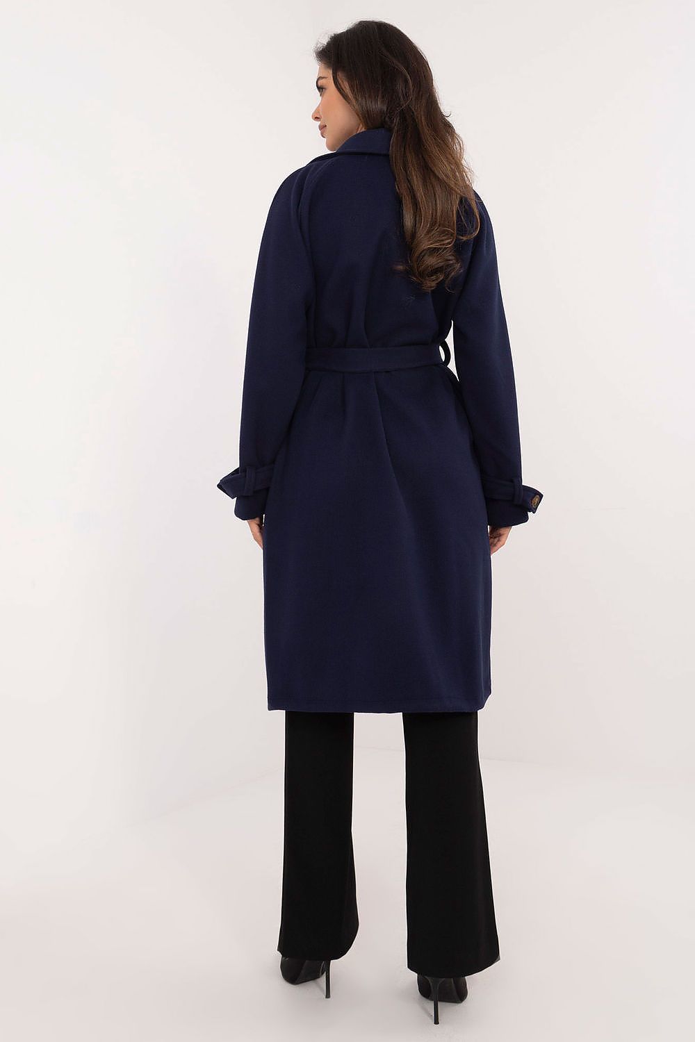 Model showcasing Och Bella's elegant women's trench coat with button closure and tailored fit, embodying timeless fashion and luxury style for modern women.