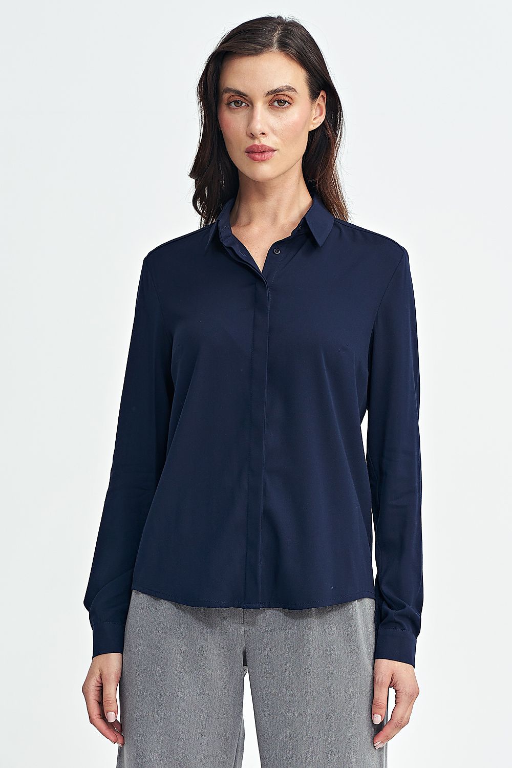 Elegant long sleeve women's shirt by Nife, made from soft viscose fabric, showcasing a timeless style with a classic collar and button closure.