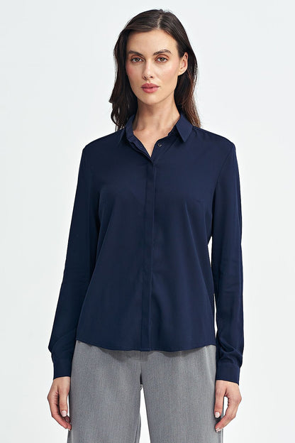Elegant long sleeve women's shirt by Nife, made from soft viscose fabric, showcasing a timeless style with a classic collar and button closure.