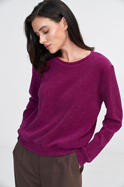 Elegant Nife blouse for women showcasing a timeless ribbed knit texture and long sleeves for a fashionable look.