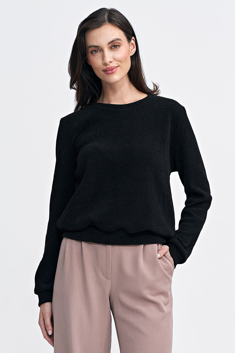 Elegant Nife blouse for women displayed on a mannequin, highlighting its versatile style suitable for various outfits and occasions.