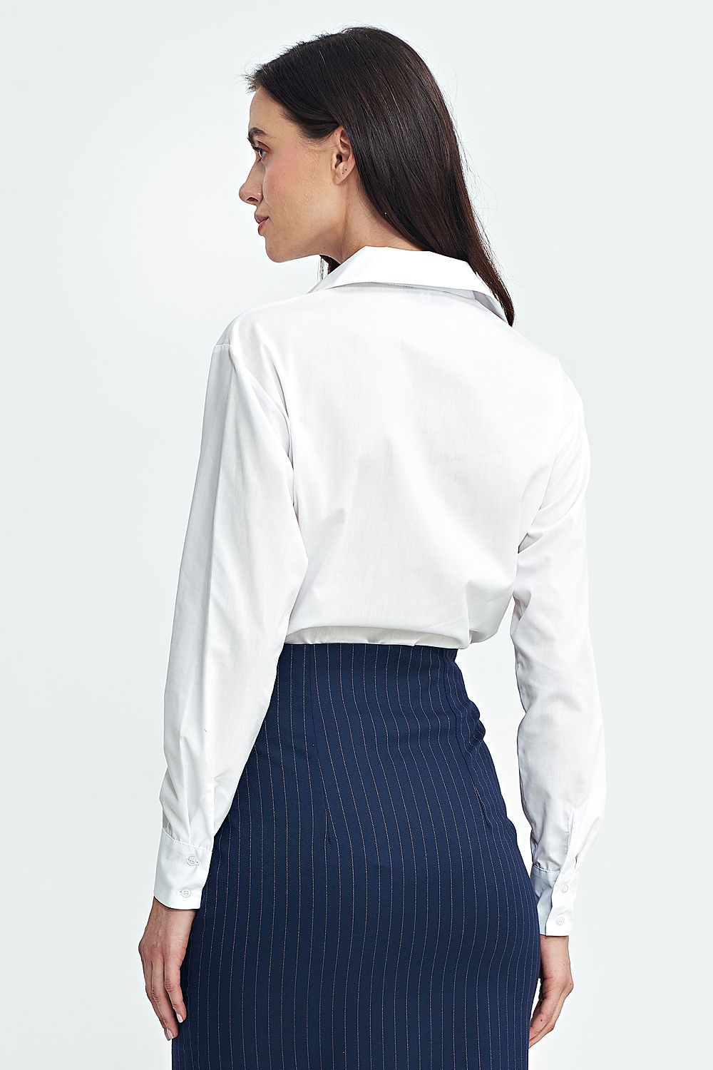 Nife shapewear bodysuit showcasing long sleeves and a button closure, designed to enhance the feminine silhouette while ensuring breathability and comfort.